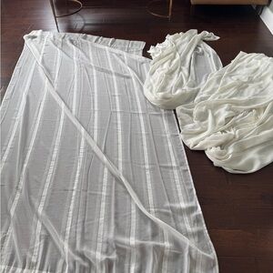 FOUR PANELS of 52 x 90 inches semi sheer curtains